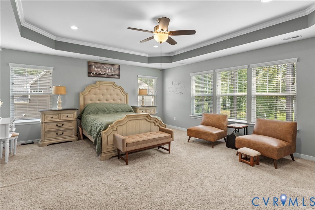 8800 Glen Royal Drive, Chesterfield, VA 23832 Spacious bedroom featuring light neutral carpeting, a tray ceiling with a ceiling fan, and recessed lighting