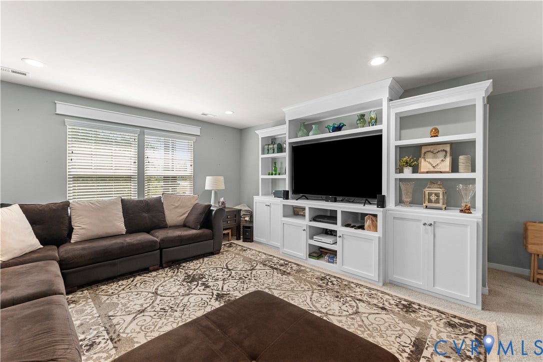 8800 Glen Royal Drive, Chesterfield, VA 23832 Built-in media center with white cabinetry and open shelving, recessed lighting,