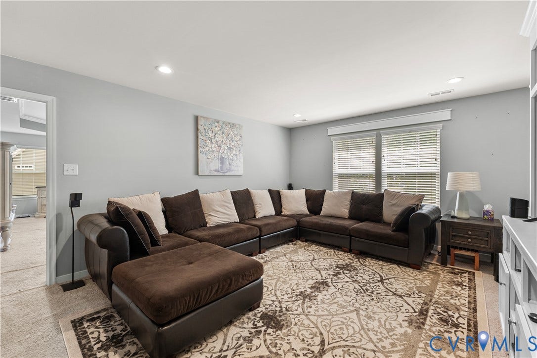 8800 Glen Royal Drive, Chesterfield, VA 23832 Recessed ceiling lighting illuminates the carpeted living area