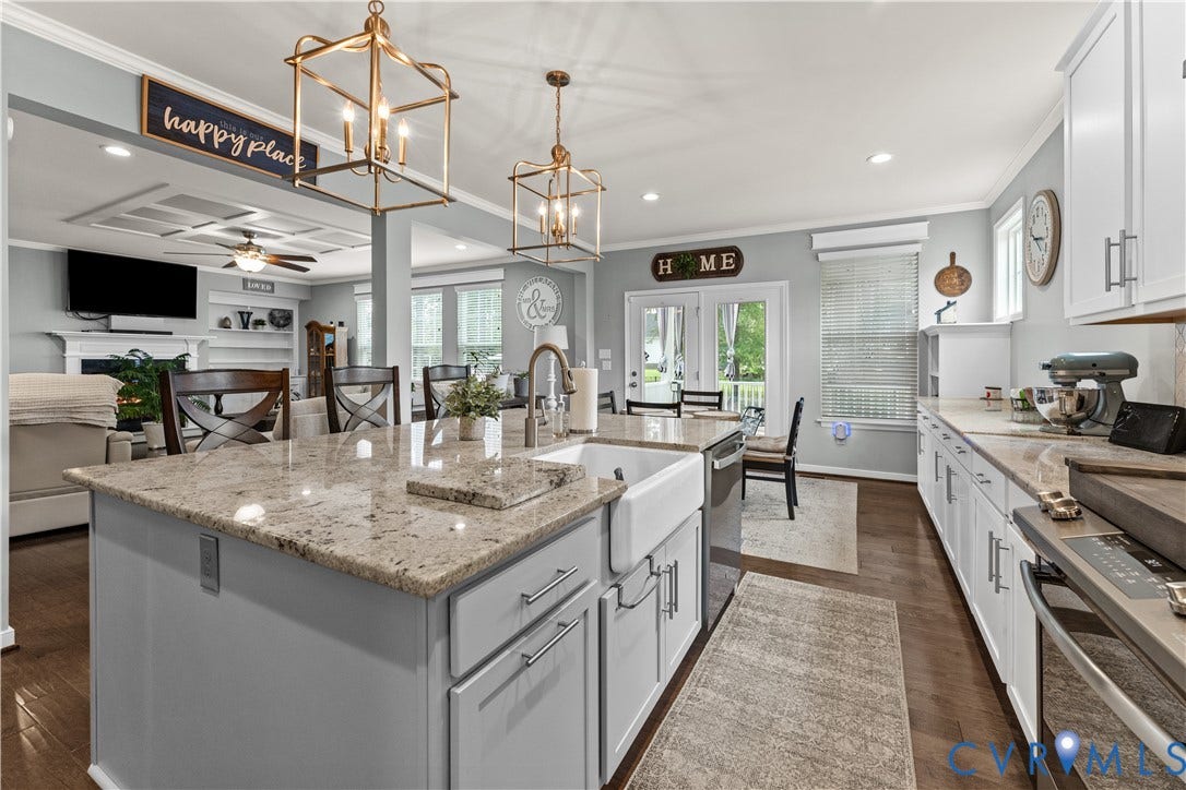 8800 Glen Royal Drive, Chesterfield, VA 23832 Spacious kitchen with a large central island featuring a farmhouse sink and granite countertops