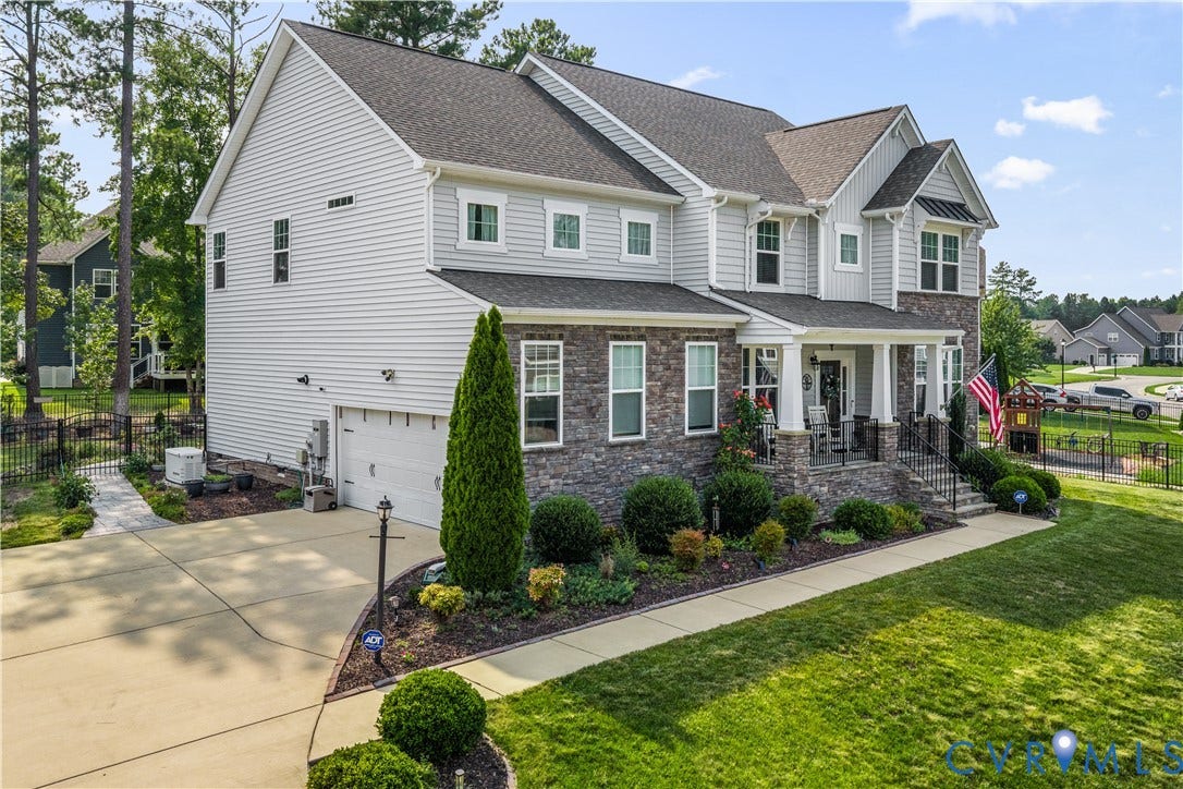 8800 Glen Royal Drive, Chesterfield, VA 23832 Two-story residence featuring light gray siding and a stone facade