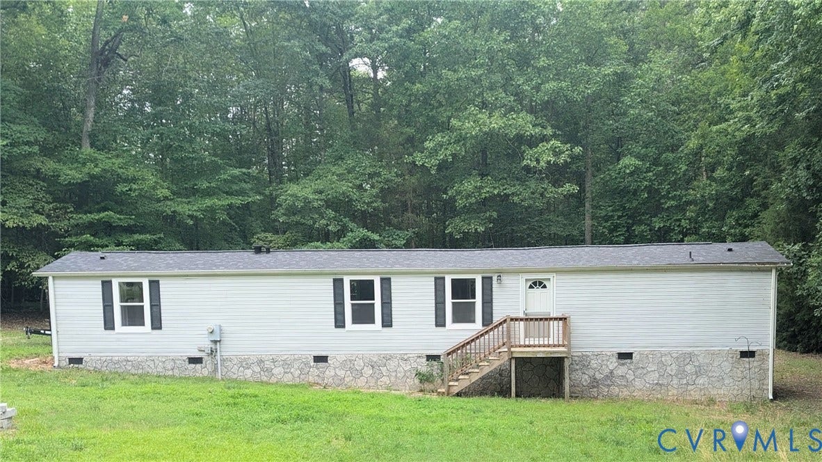 5959 Derwent Road, Powhatan, VA 23139 Light-colored siding exterior featuring dark shutters and a stone-finish foundation