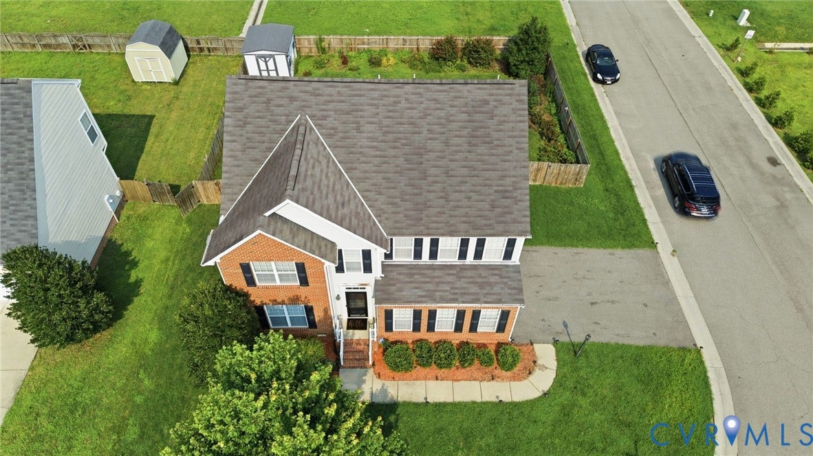 5713 Kings Grove Drive, Kings Grove, Chesterfield, VA 23832 Two-story residence featuring a brick and siding exterior, a gabled roof, and a paved driveway