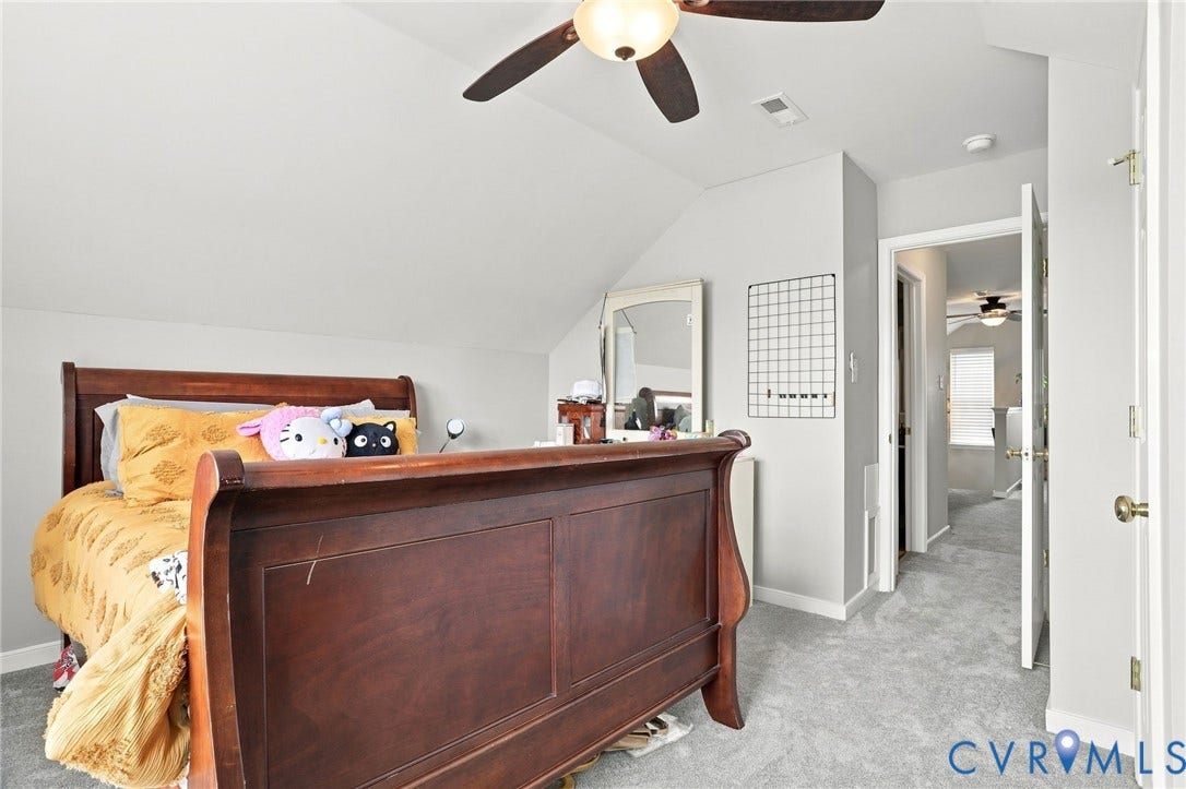 5713 Kings Grove Drive, Kings Grove, Chesterfield, VA 23832 Carpeted interior space with a vaulted ceiling and a ceiling fan with integrated lighting
