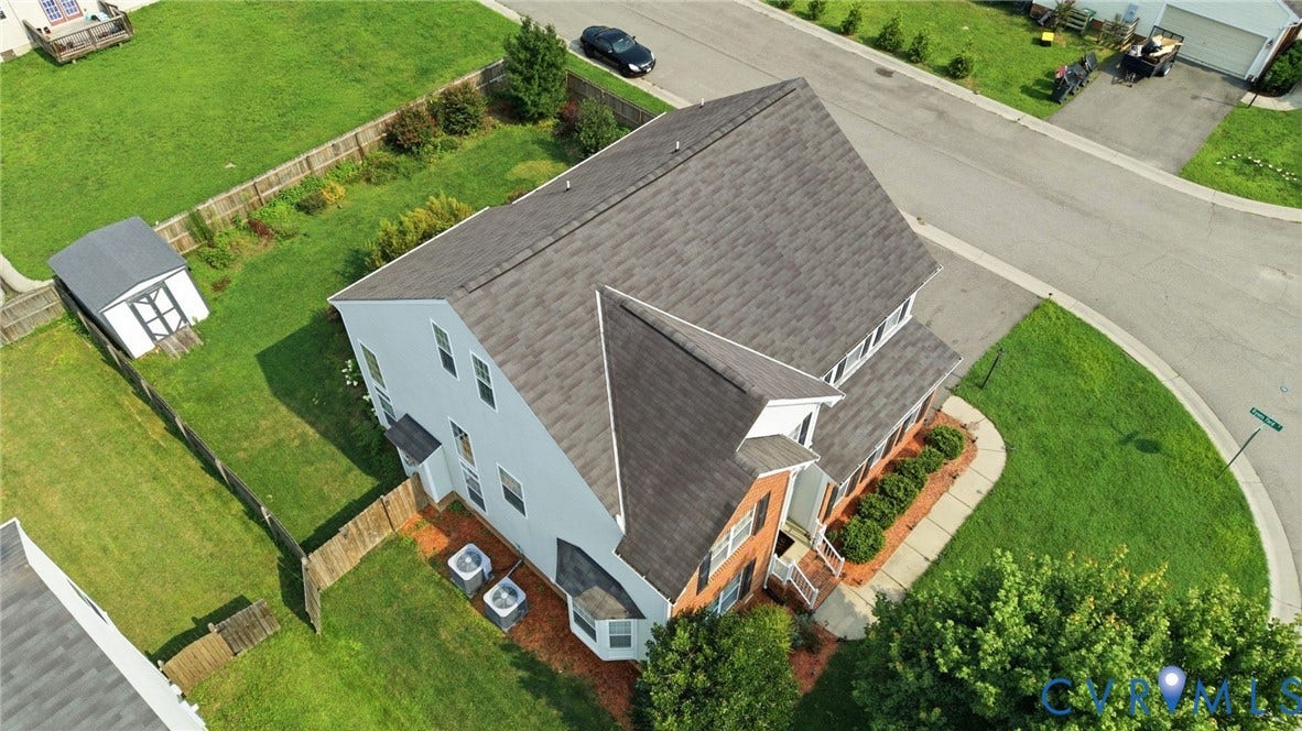 5713 Kings Grove Drive, Kings Grove, Chesterfield, VA 23832 Two-story residence with a gray shingle roof, light-colored siding, and brick accents