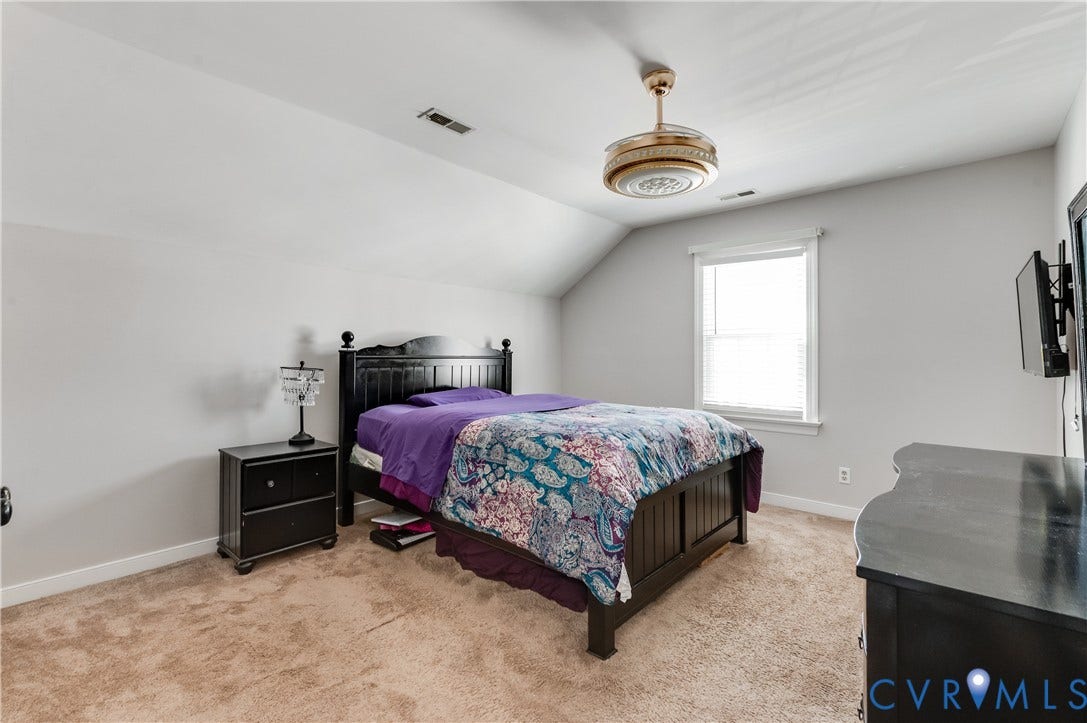 11611 Riverpark Way, Chesterfield, VA 23838 Carpeted room with sloped ceiling, light gray walls, and a window with blinds