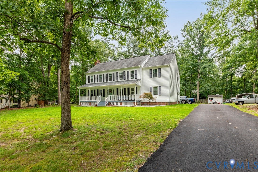 11611 Riverpark Way, Chesterfield, VA 23838 Two-story residence featuring white siding and black window shutters