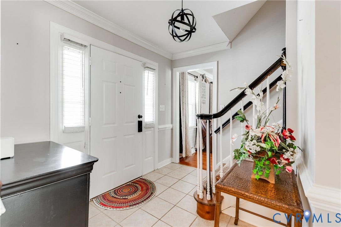 11611 Riverpark Way, Chesterfield, VA 23838 Entry foyer featuring tiled flooring, a white front door with sidelights, and an overhead spherical light fixture