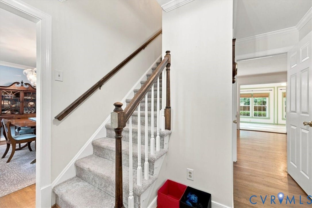 10204 Steuben Drive, Henrico, VA 23060 Carpeted staircase with wood handrail and white balusters