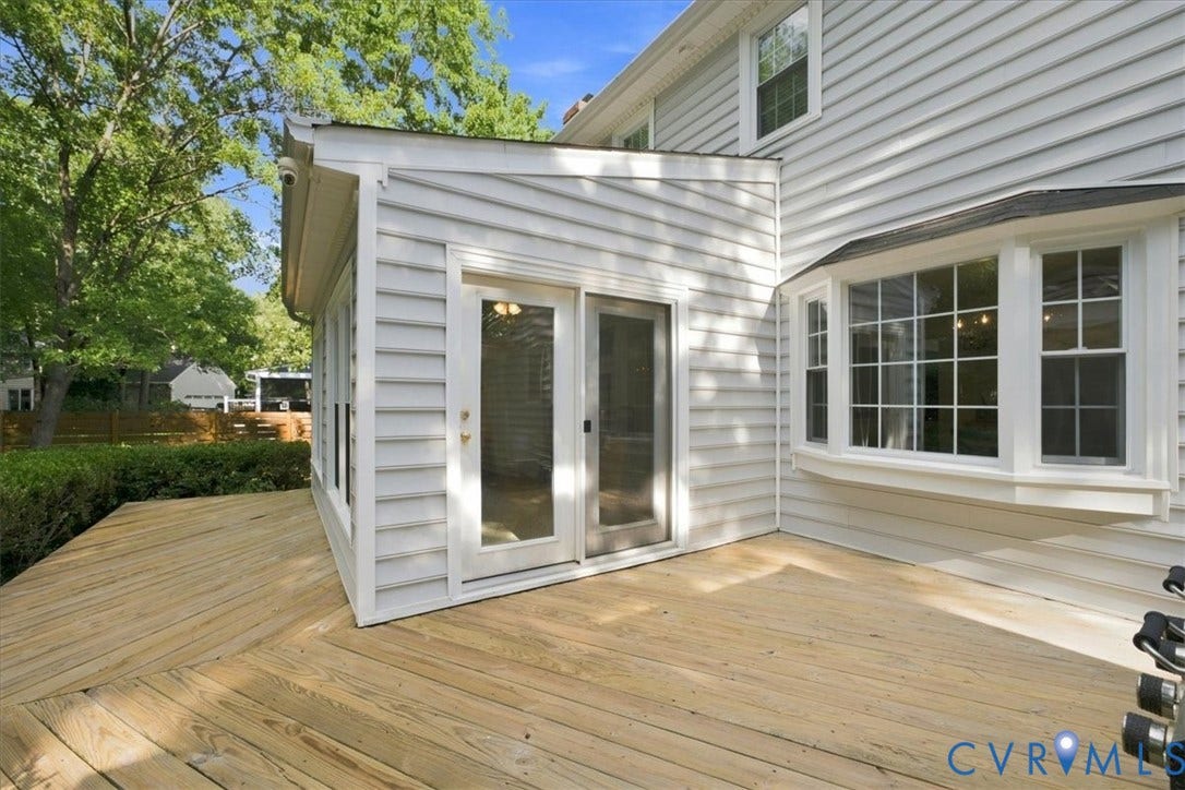 10204 Steuben Drive, Henrico, VA 23060 Expansive wood deck with a diagonal plank pattern