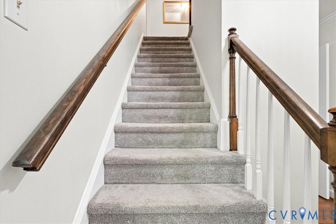 10204 Steuben Drive, Henrico, VA 23060 Carpeted staircase with dark wood-finish handrails and white balusters