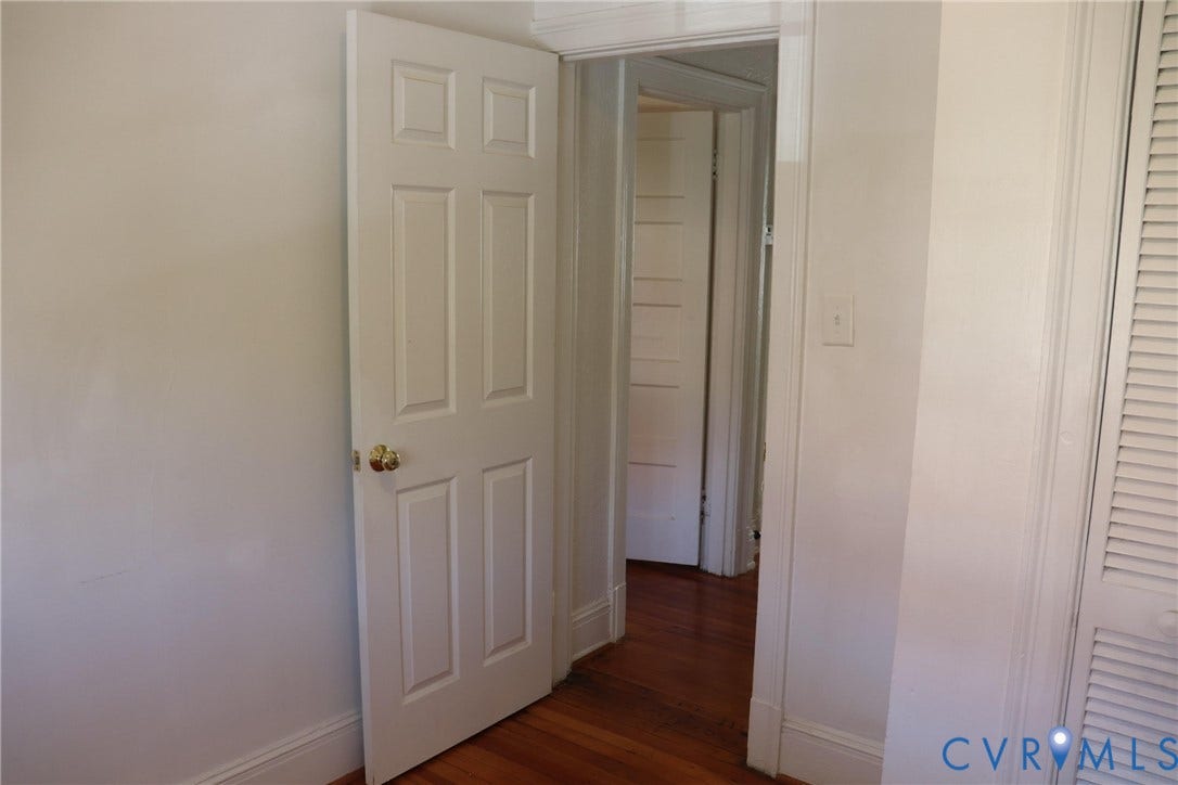 1119 W Grace Street, The Fan District, Richmond, VA 23220 Six-panel interior door with brass hardware