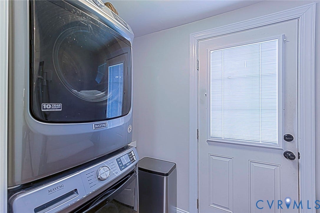 501 Pelham Drive, Richmond, VA 23222 laundry area featuring a stacked washer and dryer unit