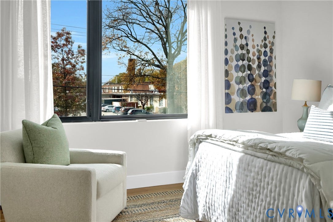 4506 1/2 Grove Avenue, Munford On Grove, Richmond, VA 23221 Expansive window with dark framing and white sheer drapery