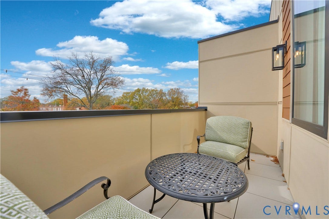 4506 1/2 Grove Avenue, Munford On Grove, Richmond, VA 23221 Private outdoor balcony with a concrete surface and a metal railing