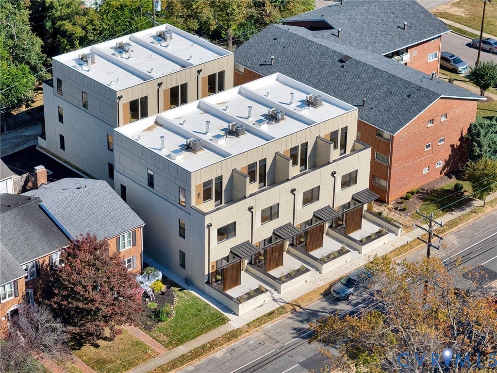 4506 1/2 Grove Avenue, Munford On Grove, Richmond, VA 23221 Contemporary multi-story facades featuring light-toned paneling and dark-framed windows