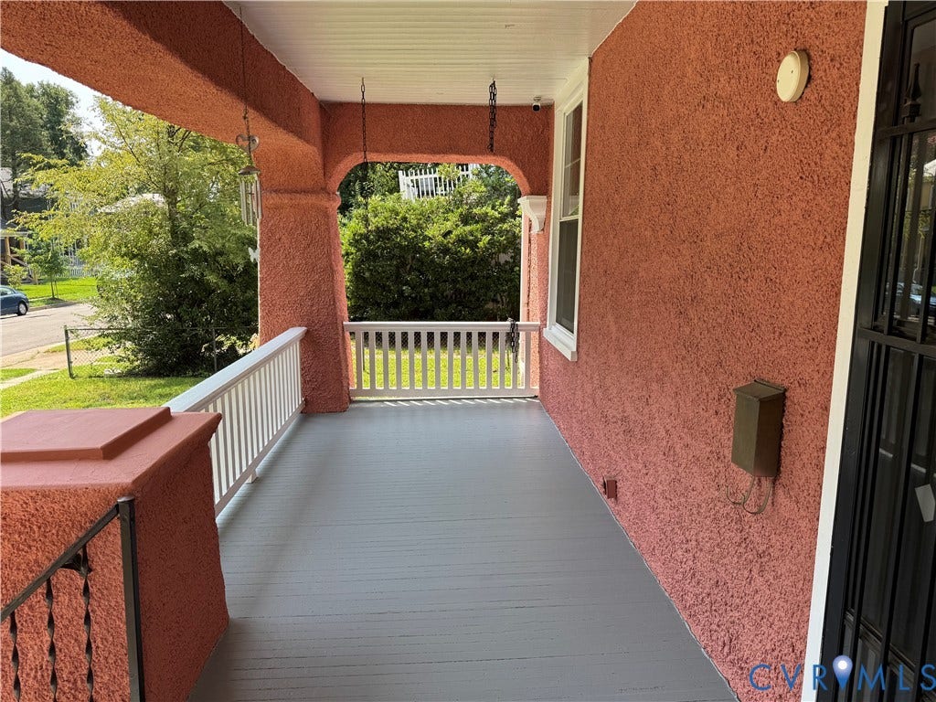 3118 Barton Avenue, Brookland Park, Richmond, VA 23222 Inviting covered porch with a painted floor, white railing, and textured exterior finish