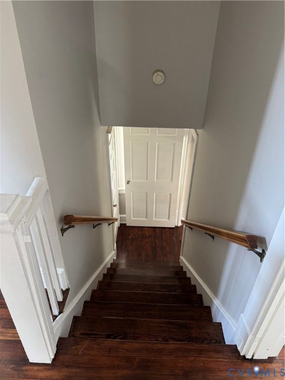 3118 Barton Avenue, Brookland Park, Richmond, VA 23222 Elegant staircase featuring rich wood-finish treads, white painted risers, and traditional wood handrails