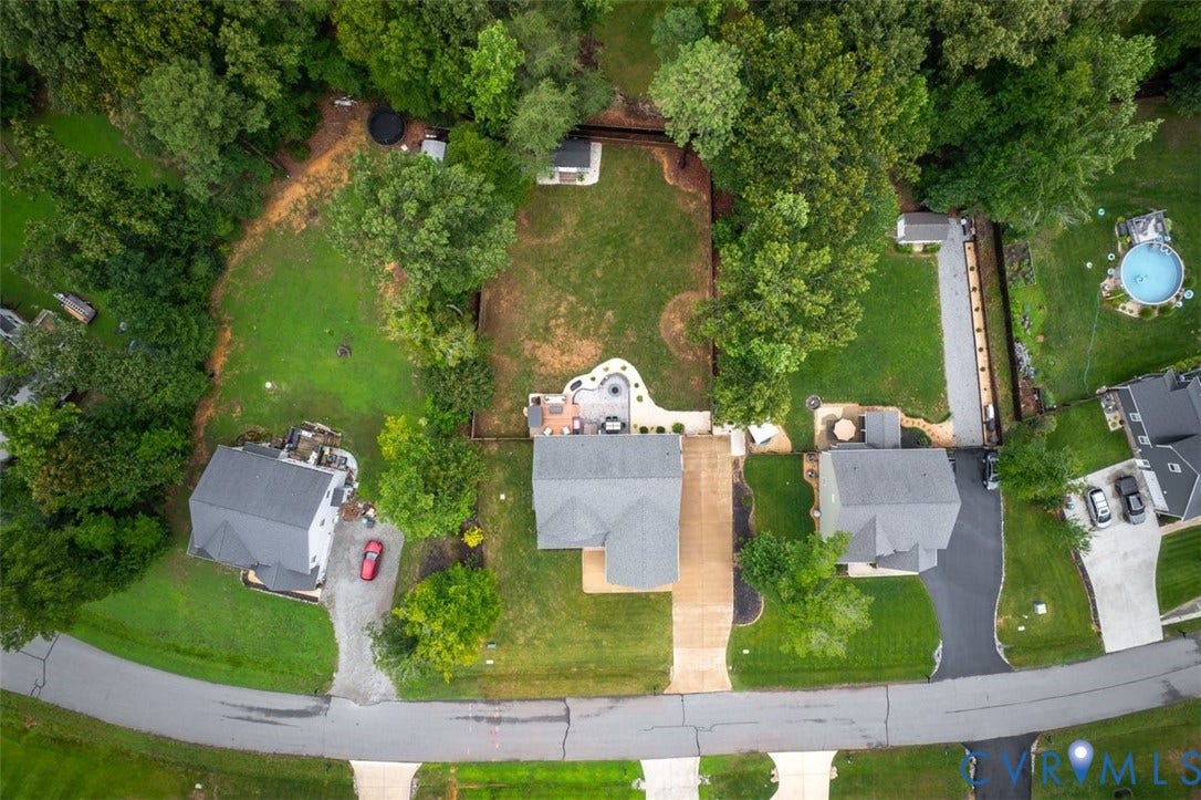 9081 Deerlake Drive, Charming, New Kent, VA 23124 Expansive property featuring a large, rectangular lot with mature trees and a substantial grassy area