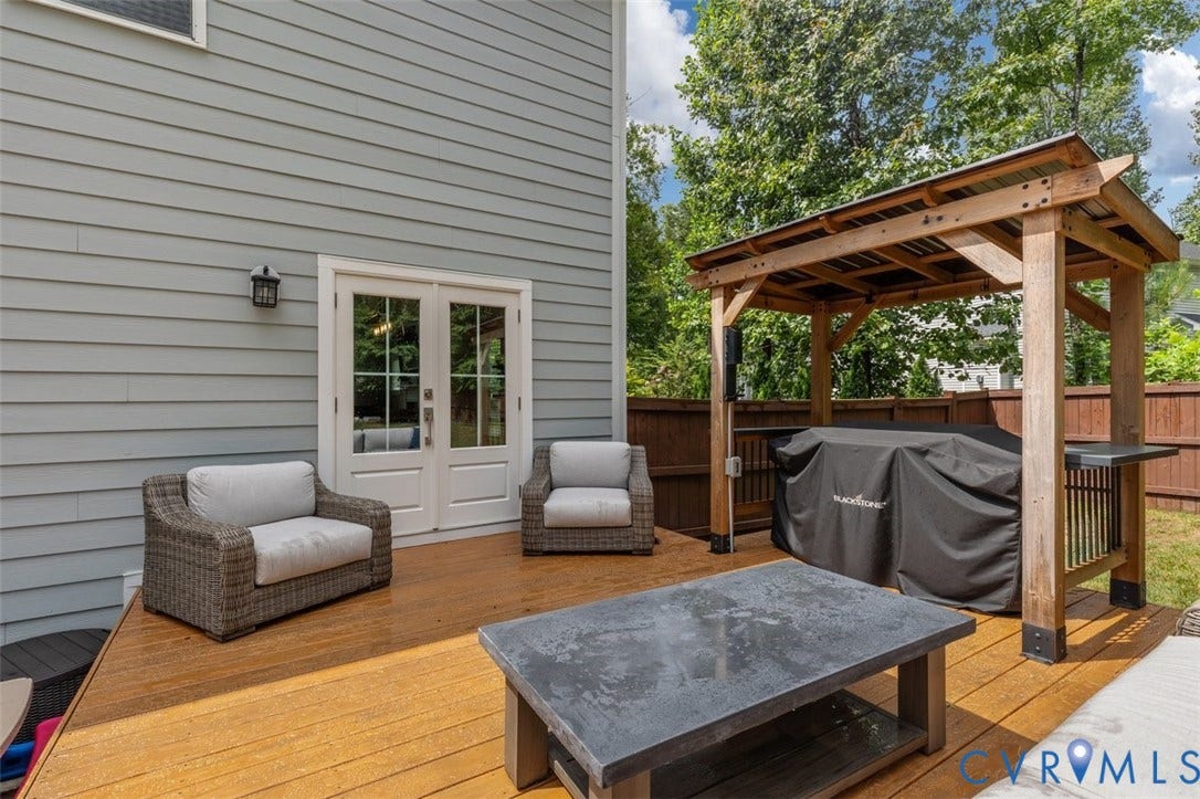 9081 Deerlake Drive, Charming, New Kent, VA 23124 Spacious outdoor entertaining deck, patio, and rear fenced yard