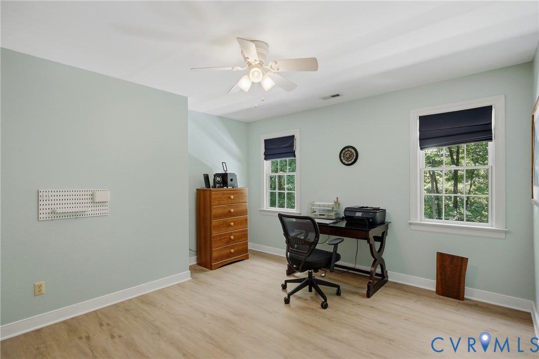 1915 Norwood Creek Drive, Powhatan, VA 23139 Room featuring light-toned walls, wood-finish flooring, and white baseboards