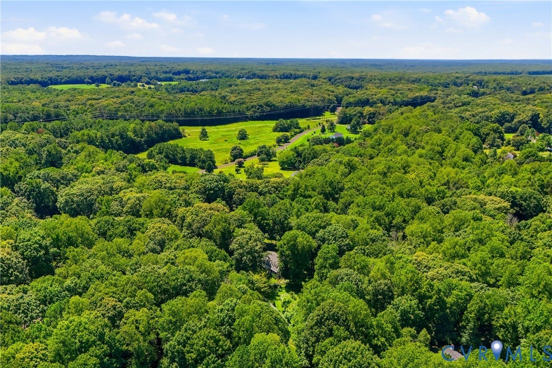 1915 Norwood Creek Drive, Powhatan, VA 23139 Expansive aerial perspective showcasing significant wooded acreage