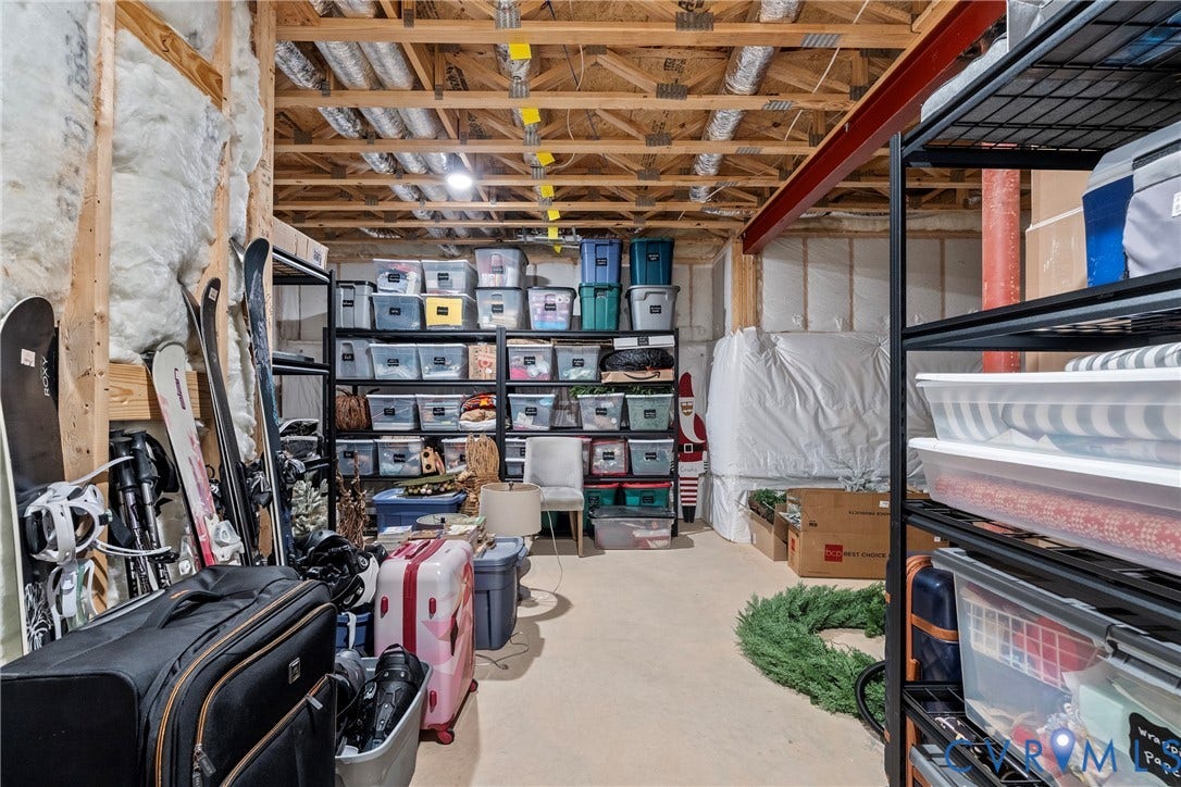 18312 Barrin Court, Barrington, Moseley, VA 23120 Unfinished basement space with exposed wooden joists and insulation