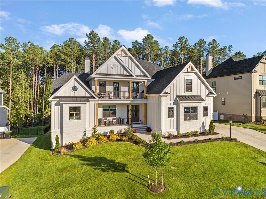 18312 Barrin Court, Barrington, Moseley, VA 23120 White exterior with board and batten siding and dark trim windows