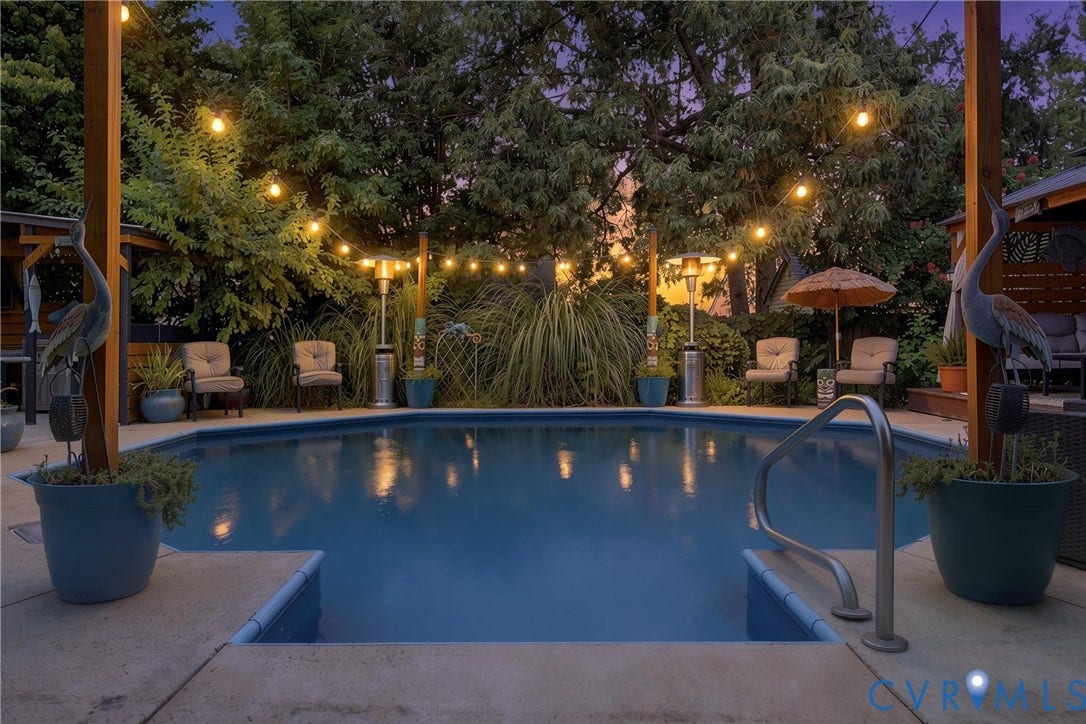Geometric-shaped swimming pool with concrete surround