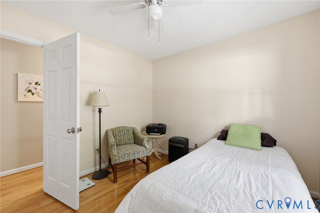 3300 Woodsong Drive, Midlothian, VA 23112 Interior room featuring wood-finish flooring, light-toned wall paint, and a ceiling fan with integrated lighting