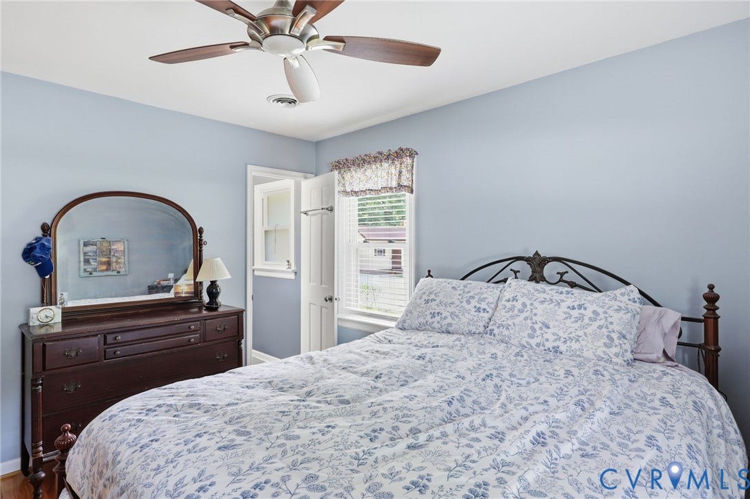 3300 Woodsong Drive, Midlothian, VA 23112 Bedroom featuring light blue walls and a ceiling fan with wood-finish blades