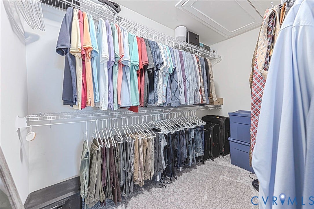 7205 Desert Candle Drive, Moseley, VA 23120 Walk-in closet featuring multi-level wire shelving, white walls, and gray carpet flooring