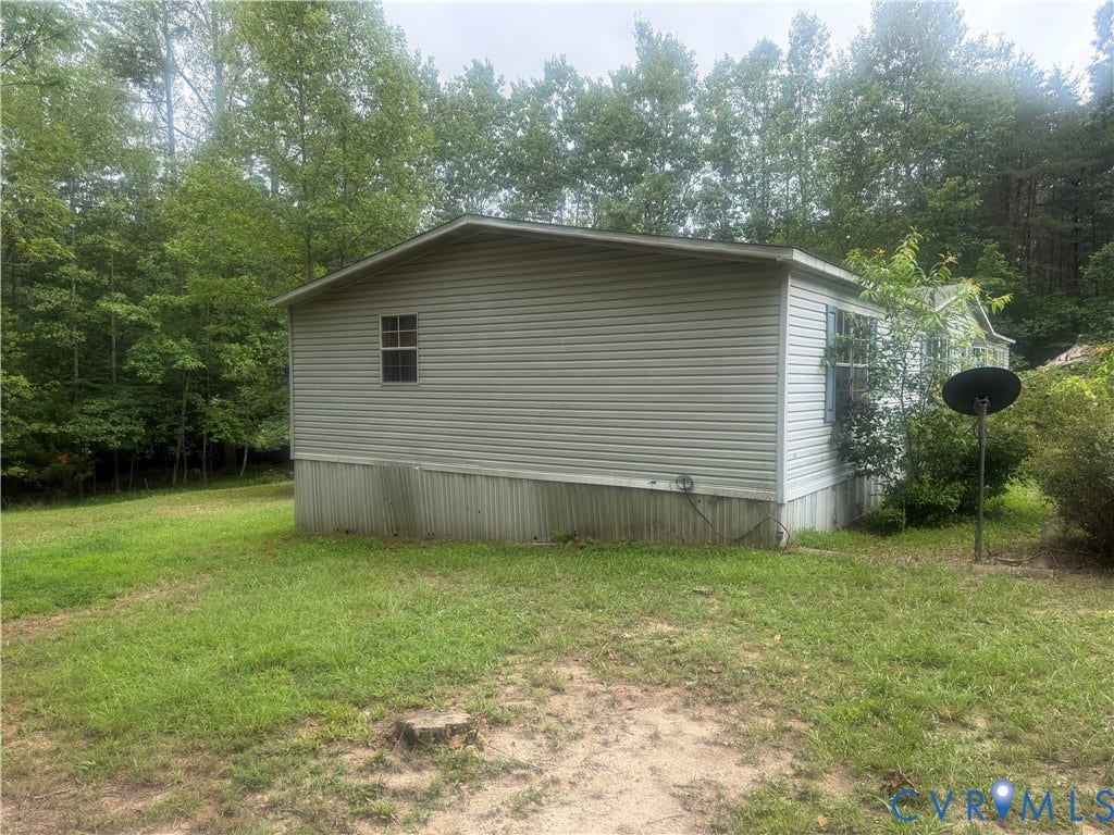 652 Mallorys Ford Road, Cool Springs, Louisa, VA 23093 Exterior siding in a light neutral tone