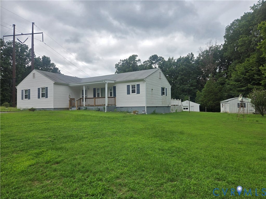 2311 Georges Road, Powhatan, VA 23139 Ranch-style residence featuring white siding and dark shutters, set on a broad grass lawn