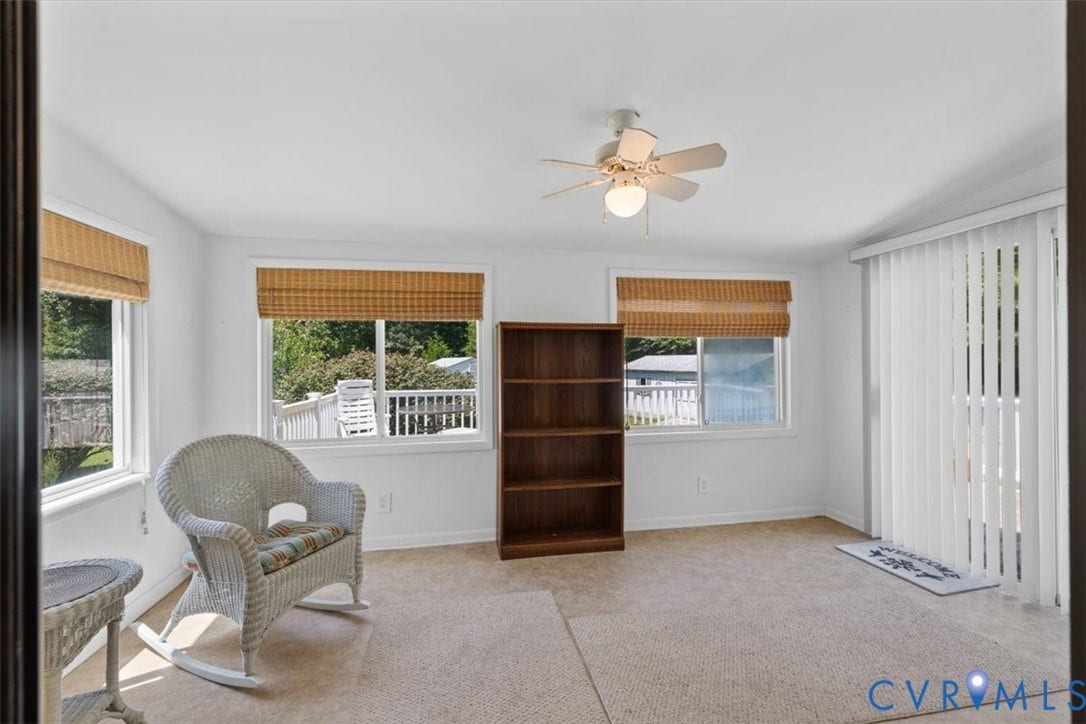 2311 Georges Road, Powhatan, VA 23139 Bright room with multiple windows featuring woven wood shades