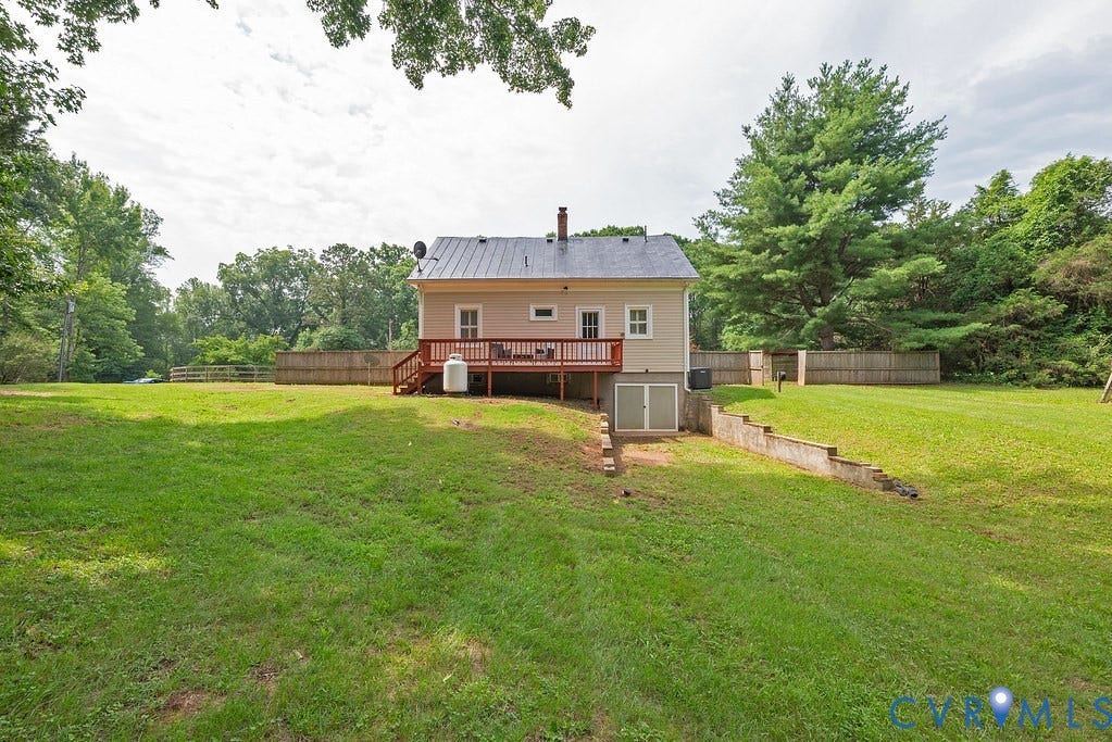 4808 River Road W Road, Goochland, VA 23063 Expansive green lawn with mature trees bordering the property
