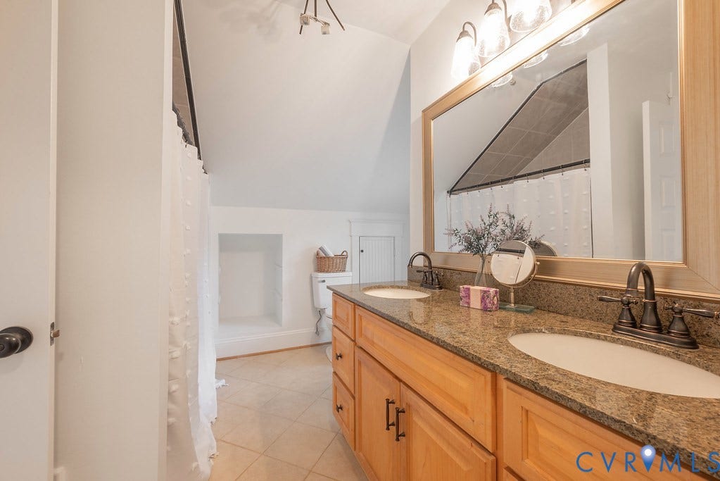 4808 River Road W Road, Goochland, VA 23063 Double vanity with granite countertop, tub and shower