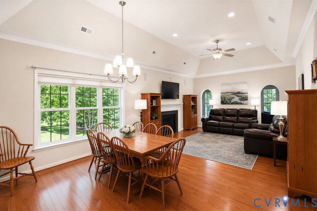 14007 Shawhan Court, Charter Colony, Midlothian, VA 23114 Vaulted ceilings, wood-finish flooring, a fireplace with a mantel, and arched windows