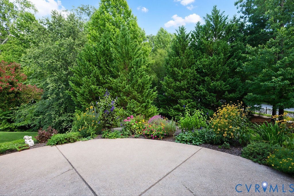 14007 Shawhan Court, Charter Colony, Midlothian, VA 23114 Paved hardscaping with a border of diverse plantings and mature trees