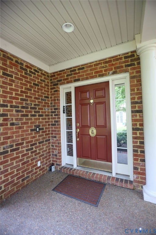 14007 Shawhan Court, Charter Colony, Midlothian, VA 23114 Brick exterior featuring a covered entry, recessed lighting, and a red panel door with sidelights