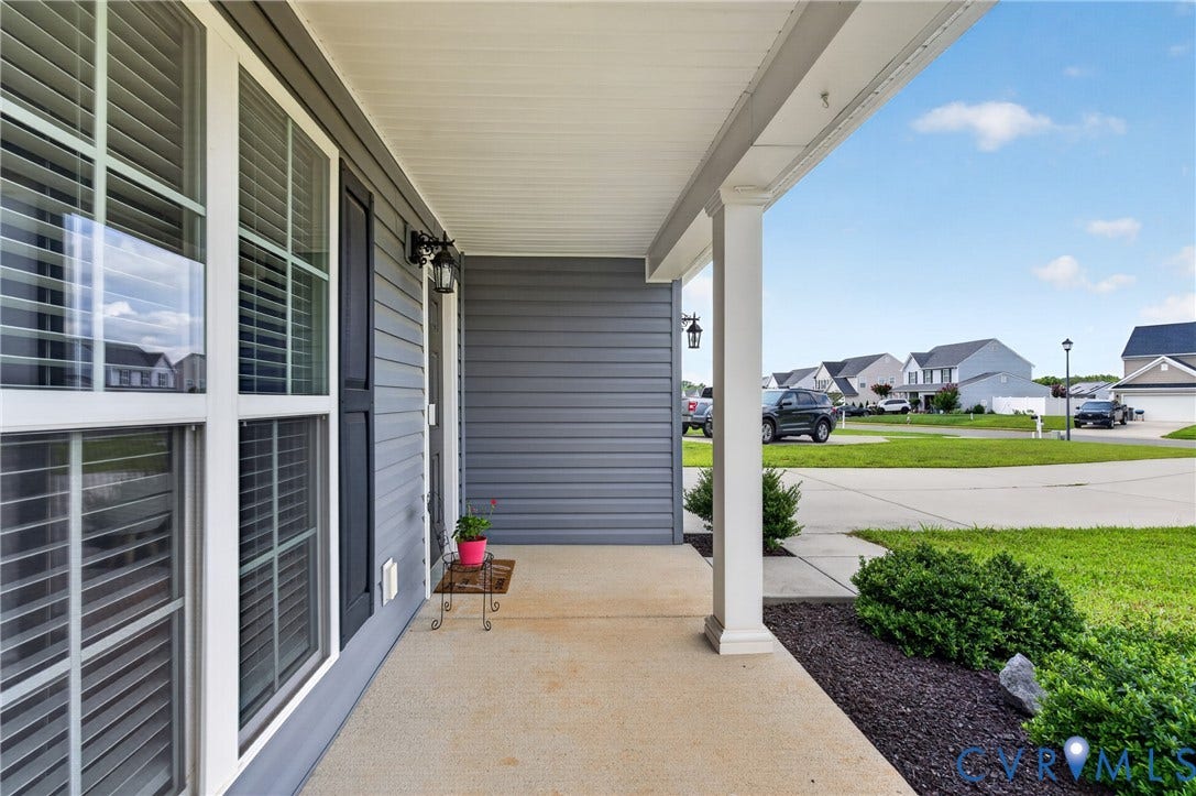 311 Cardinal Road, Countryside, Louisa, VA 23093 Covered front porch featuring a concrete surface and white support columns