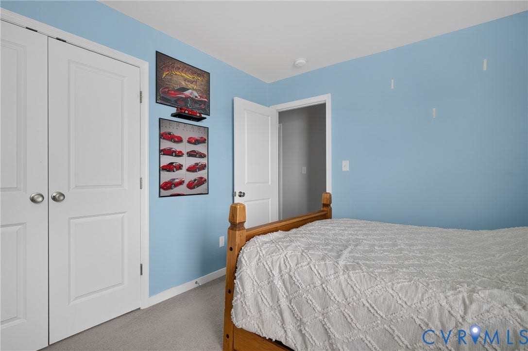 311 Cardinal Road, Countryside, Louisa, VA 23093 Bedroom featuring light blue walls and neutral carpet
