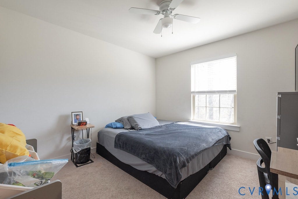 10419 Centralia Station Road, Chester, VA 23831 Bedroom featuring light neutral wall paint, carpet flooring, a window with horizontal blinds, and a ceiling fan with integrated lighting