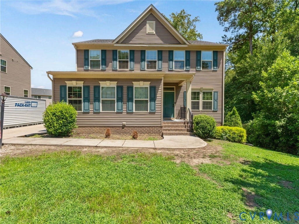 10419 Centralia Station Road, Chester, VA 23831 Two-story home featuring horizontal siding and a prominent gable
