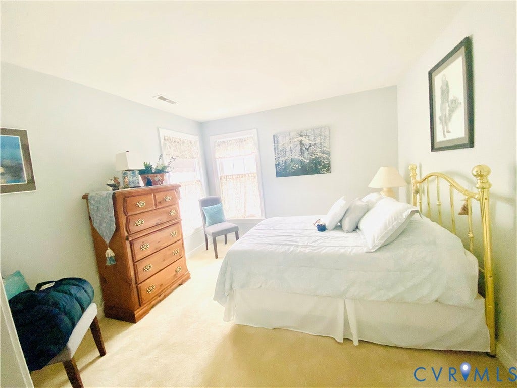 3267 Bayberry Lane, Goochland, VA 23063 Light-filled room featuring neutral wall tones and a soft, neutral carpet