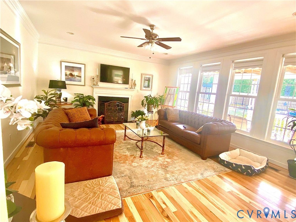 3267 Bayberry Lane, Goochland, VA 23063 Living area featuring light wood-finish flooring and a decorative area rug