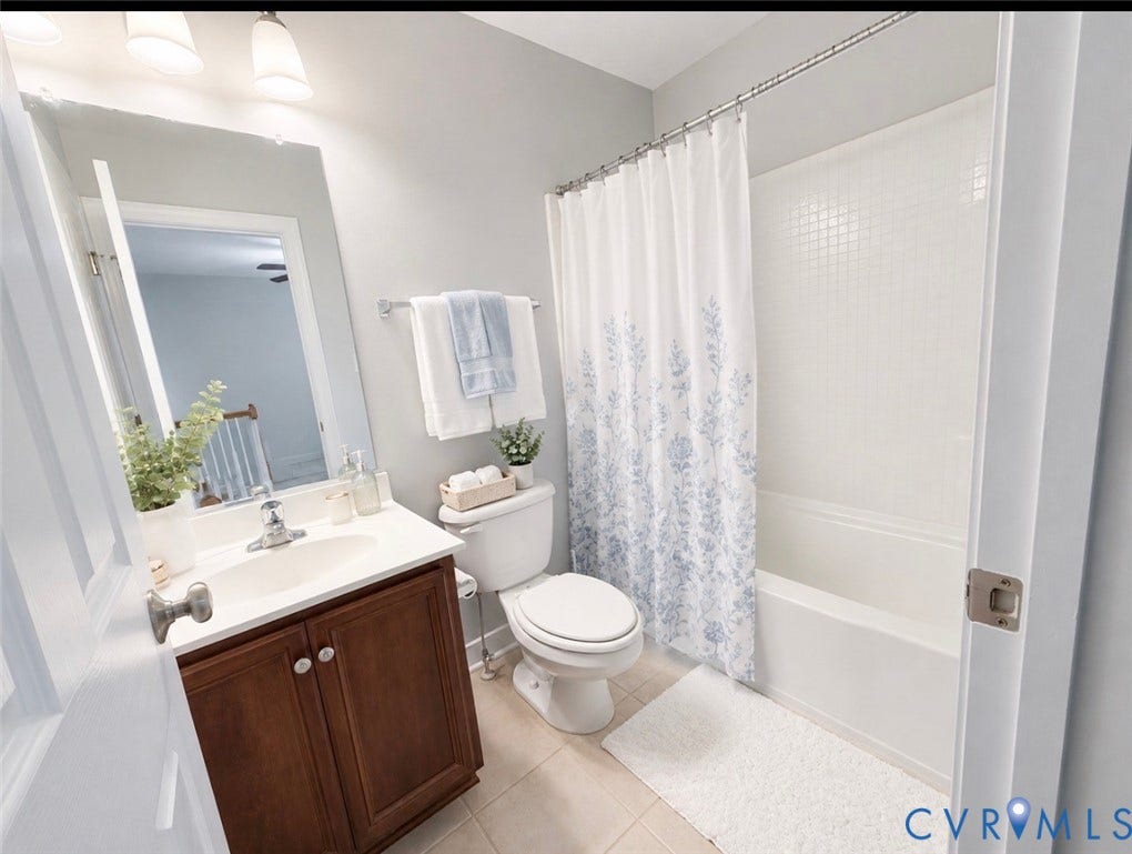 3267 Bayberry Lane, Goochland, VA 23063 Full bathroom featuring a single vanity with wood-finish cabinetry, a white countertop, and a built-in sink