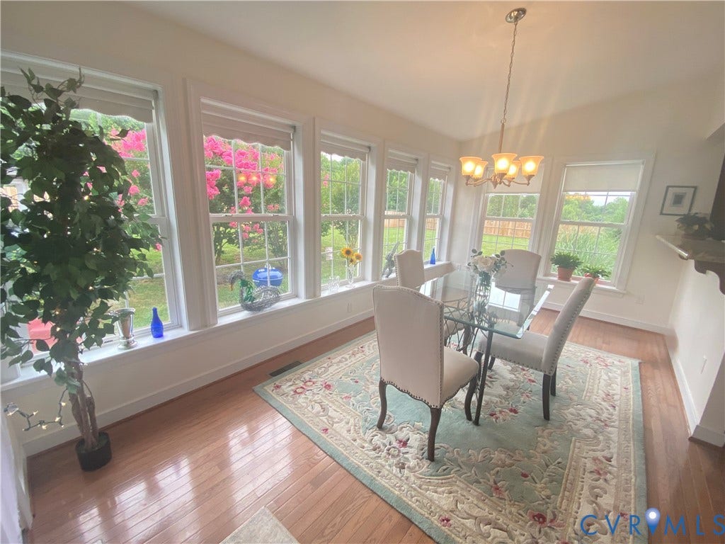 3267 Bayberry Lane, Goochland, VA 23063 Bright dining area featuring wood-finish flooring and a vaulted ceiling