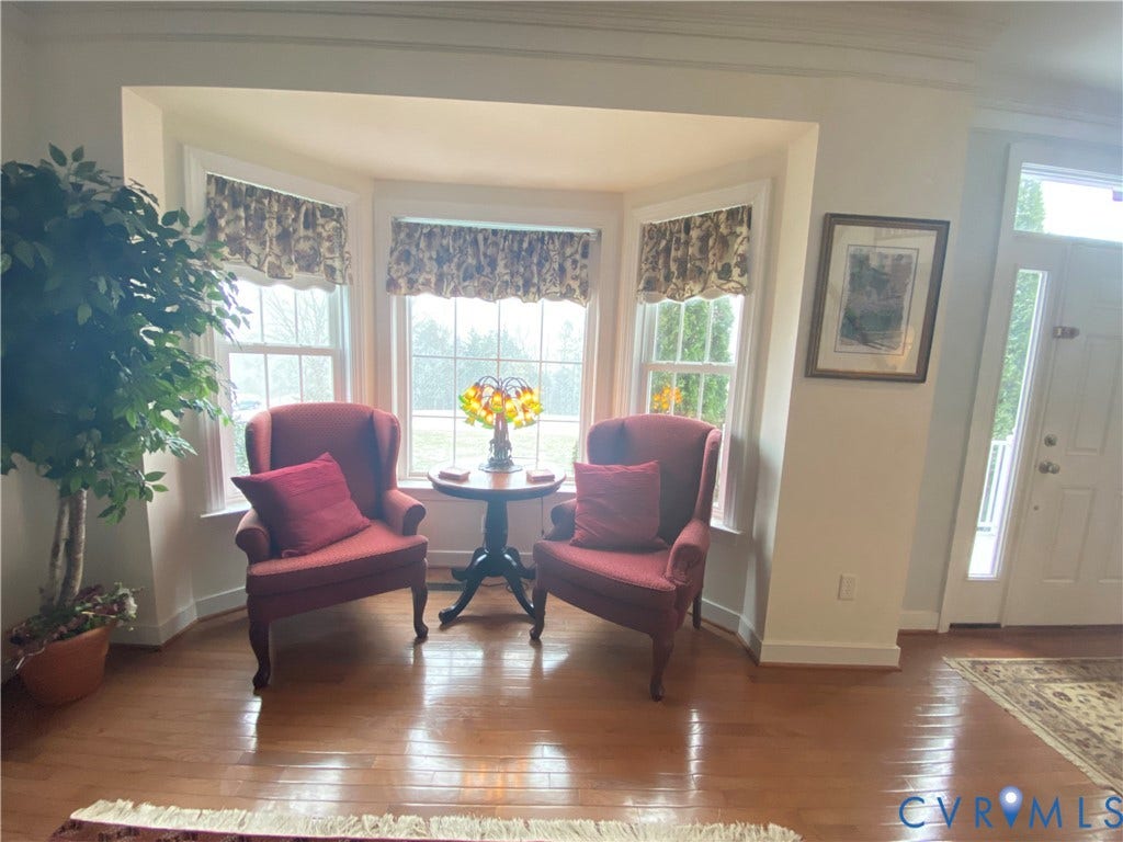 3267 Bayberry Lane, Goochland, VA 23063 Bay window seating area featuring a multi-pane window configuration and wood-finish flooring