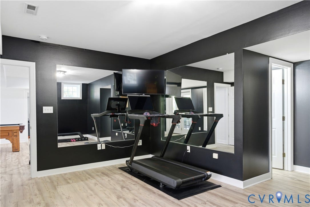 This space could be used as a bedroom and provide a separate living space in the basement. There is a private entrance from the driveway as well.
